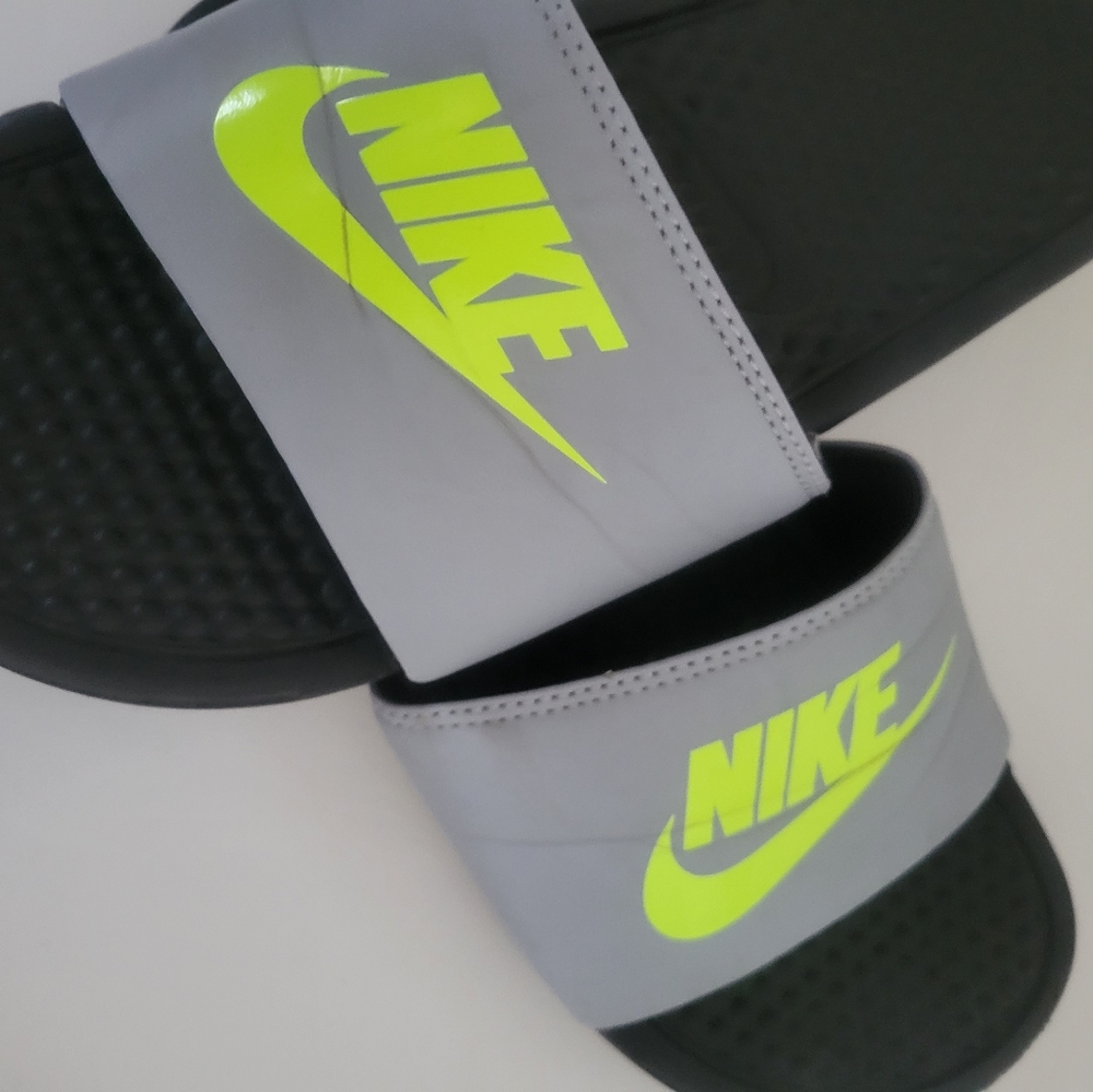 Boys Nike slides.